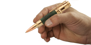 Pen being held in hand to show size of mini